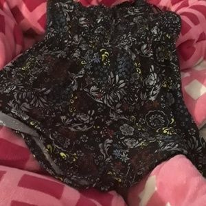 Im selling a shirt attached with shorts